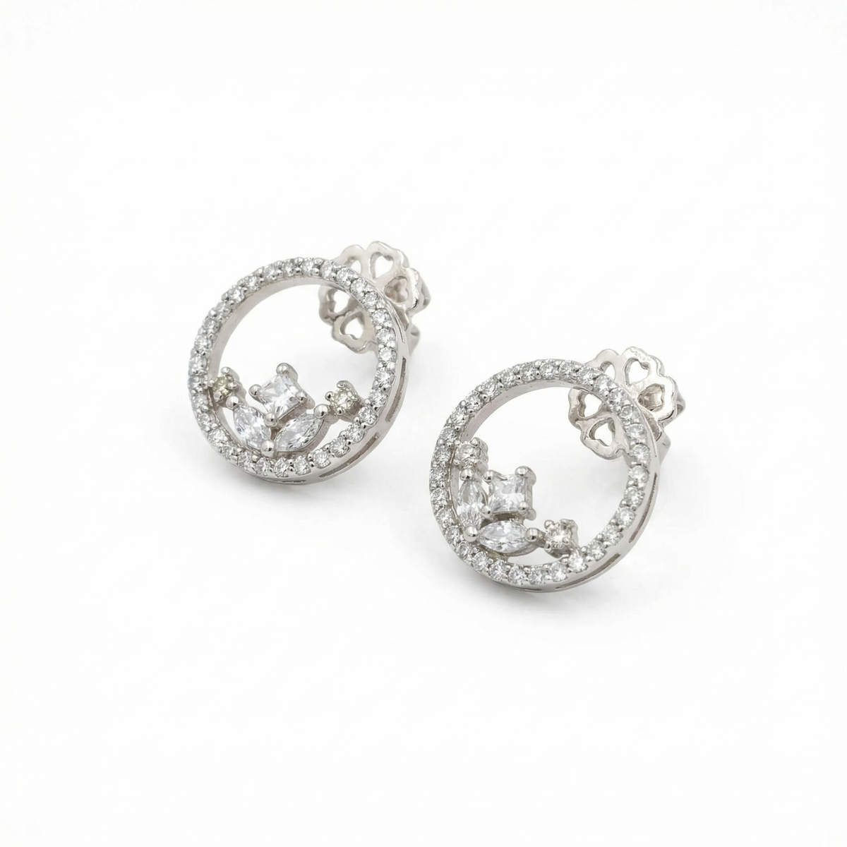 Silver heart shaped designer danglers earrings