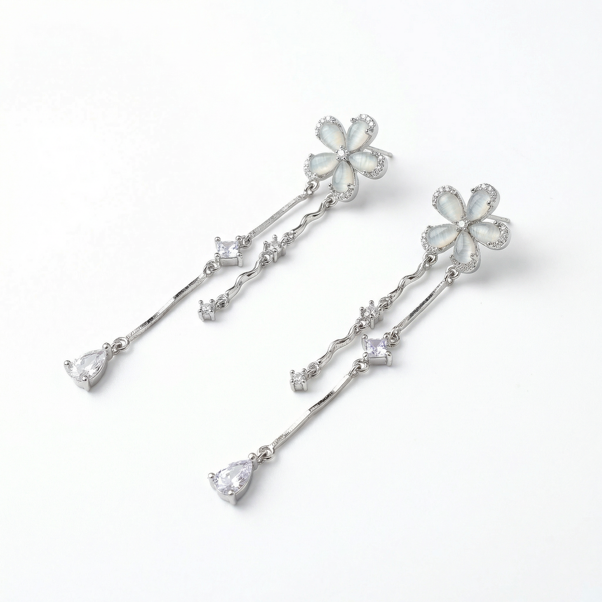 Silver flower designer danglers earrings